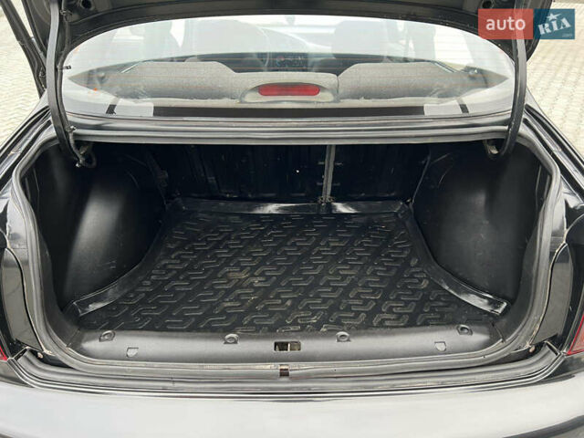 Черный Дэу Ланос, объемом двигателя 1.5 л и пробегом 158 тыс. км за 3100 $, фото 10 на Automoto.ua