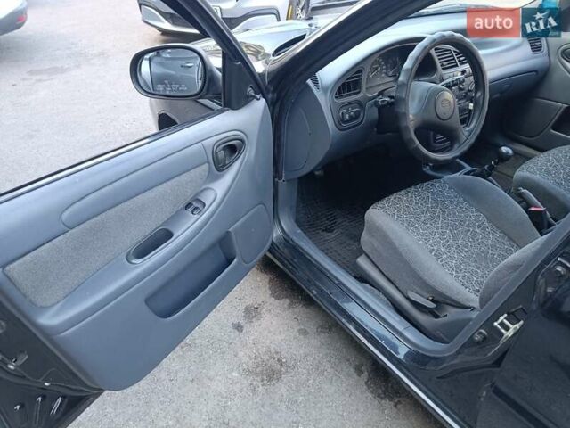 Чорний Деу Ланос, об'ємом двигуна 1.5 л та пробігом 155 тис. км за 2800 $, фото 9 на Automoto.ua