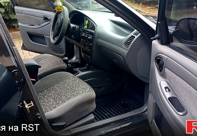 Черный Дэу Ланос, объемом двигателя 1.5 л и пробегом 170 тыс. км за 2500 $, фото 7 на Automoto.ua