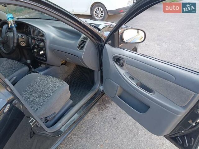 Чорний Деу Ланос, об'ємом двигуна 1.5 л та пробігом 155 тис. км за 2800 $, фото 6 на Automoto.ua