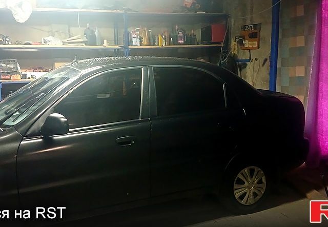 Черный Дэу Ланос, объемом двигателя 1.5 л и пробегом 170 тыс. км за 2500 $, фото 13 на Automoto.ua