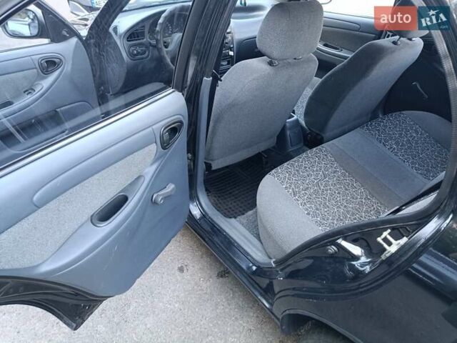 Чорний Деу Ланос, об'ємом двигуна 1.5 л та пробігом 155 тис. км за 2800 $, фото 10 на Automoto.ua