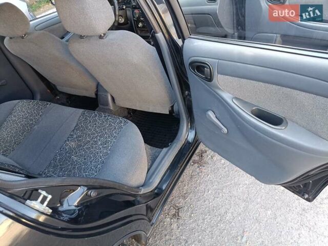 Чорний Деу Ланос, об'ємом двигуна 1.5 л та пробігом 155 тис. км за 2800 $, фото 7 на Automoto.ua