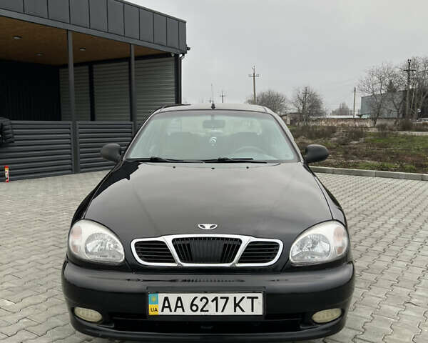 Чорний Деу Ланос, об'ємом двигуна 1.5 л та пробігом 158 тис. км за 2900 $, фото 1 на Automoto.ua
