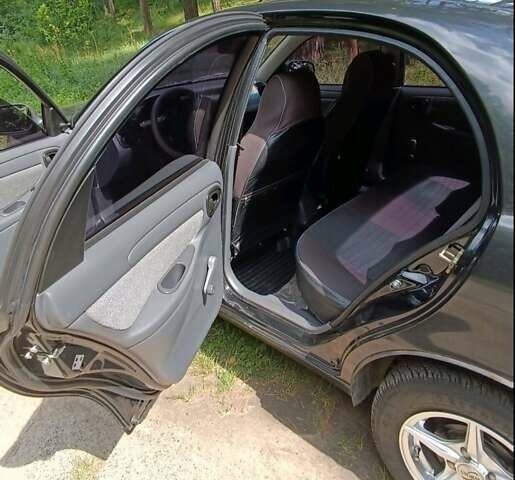 Черный Дэу Ланос, объемом двигателя 1.5 л и пробегом 26 тыс. км за 5000 $, фото 11 на Automoto.ua