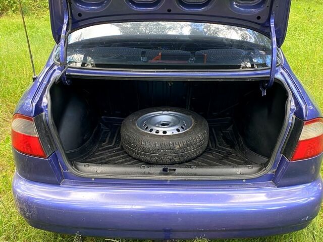 Фиолетовый Дэу Ланос, объемом двигателя 1.5 л и пробегом 400 тыс. км за 1500 $, фото 5 на Automoto.ua