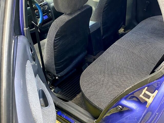 Фиолетовый Дэу Ланос, объемом двигателя 1.5 л и пробегом 400 тыс. км за 1500 $, фото 12 на Automoto.ua