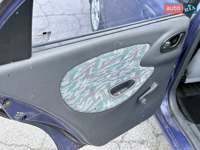 Фиолетовый Дэу Ланос, объемом двигателя 1.5 л и пробегом 190 тыс. км за 1850 $, фото 9 на Automoto.ua