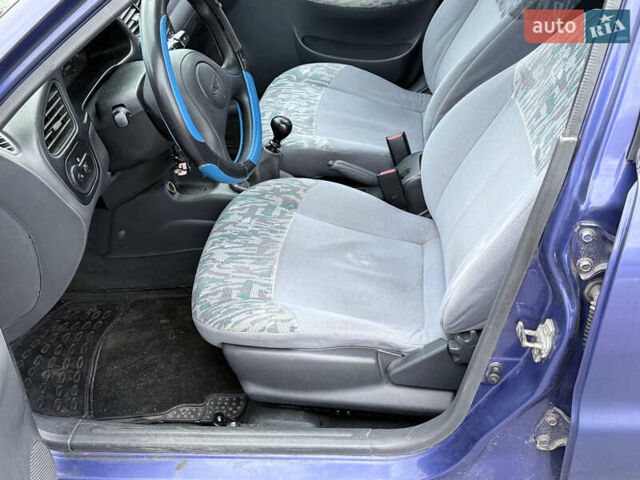 Фиолетовый Дэу Ланос, объемом двигателя 1.5 л и пробегом 190 тыс. км за 1850 $, фото 12 на Automoto.ua