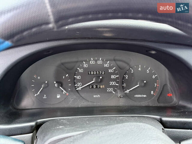 Фиолетовый Дэу Ланос, объемом двигателя 1.5 л и пробегом 190 тыс. км за 1850 $, фото 13 на Automoto.ua