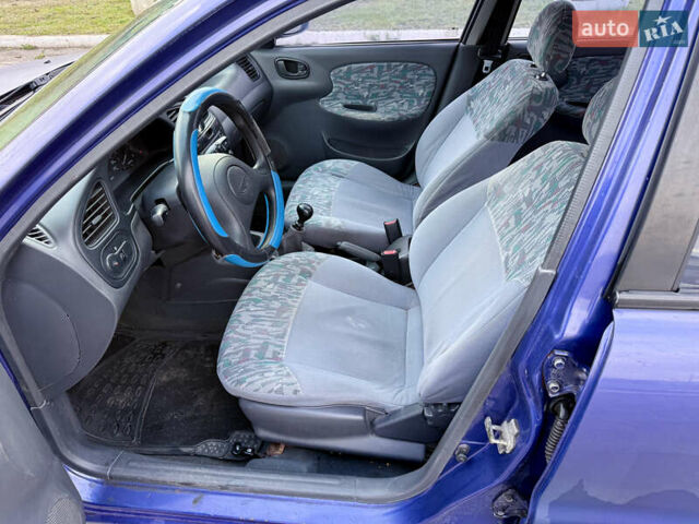 Фіолетовий Деу Ланос, об'ємом двигуна 1.5 л та пробігом 190 тис. км за 1850 $, фото 14 на Automoto.ua