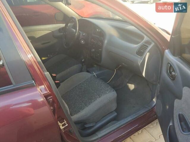 Фиолетовый Дэу Ланос, объемом двигателя 1.5 л и пробегом 280 тыс. км за 2000 $, фото 5 на Automoto.ua