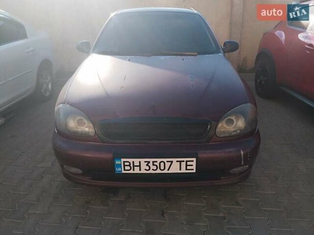 Фиолетовый Дэу Ланос, объемом двигателя 1.5 л и пробегом 280 тыс. км за 2000 $, фото 11 на Automoto.ua