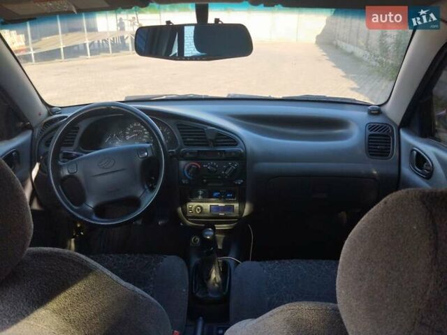 Фиолетовый Дэу Ланос, объемом двигателя 1.5 л и пробегом 280 тыс. км за 2000 $, фото 13 на Automoto.ua