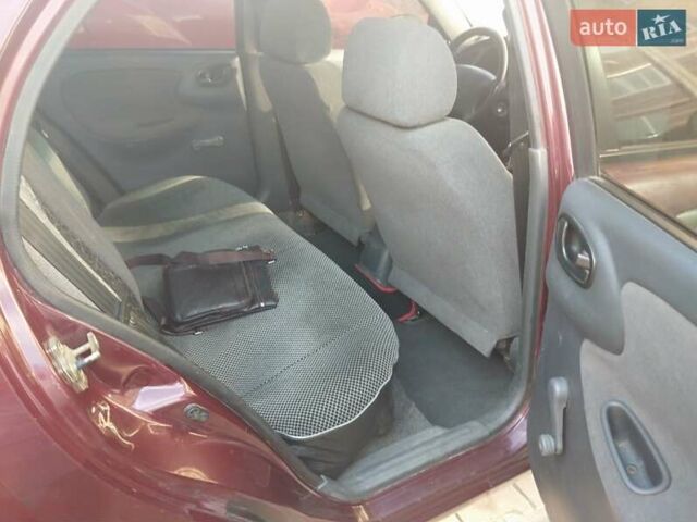 Фиолетовый Дэу Ланос, объемом двигателя 1.5 л и пробегом 280 тыс. км за 2000 $, фото 6 на Automoto.ua