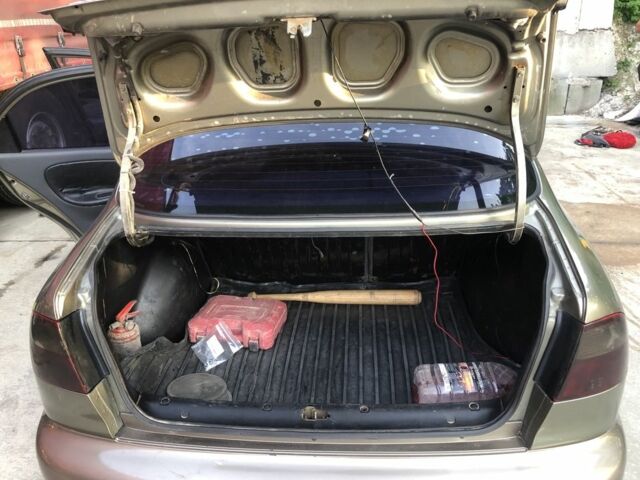 Коричневый Дэу Ланос, объемом двигателя 1.5 л и пробегом 302 тыс. км за 2300 $, фото 5 на Automoto.ua