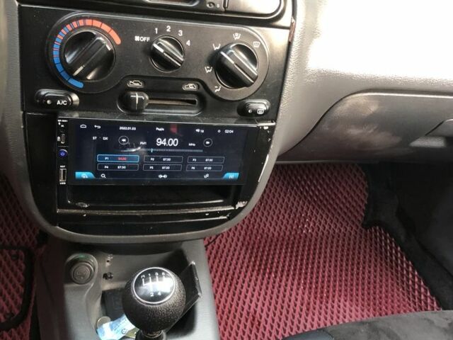 Коричневый Дэу Ланос, объемом двигателя 1.5 л и пробегом 302 тыс. км за 2300 $, фото 4 на Automoto.ua