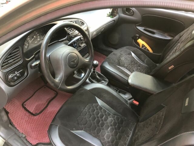 Коричневый Дэу Ланос, объемом двигателя 1.5 л и пробегом 302 тыс. км за 2300 $, фото 6 на Automoto.ua