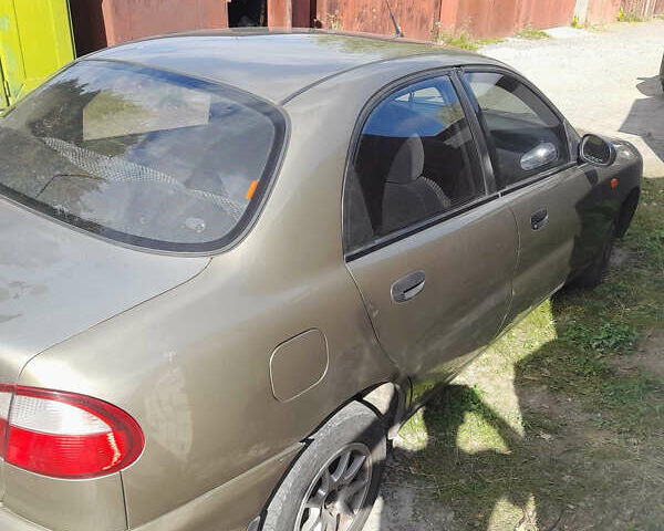 Коричневий Деу Ланос, об'ємом двигуна 1.5 л та пробігом 251 тис. км за 2500 $, фото 1 на Automoto.ua