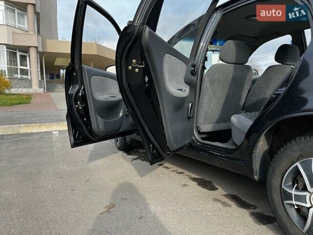 Коричневый Дэу Ланос, объемом двигателя 1.5 л и пробегом 195 тыс. км за 2350 $, фото 4 на Automoto.ua