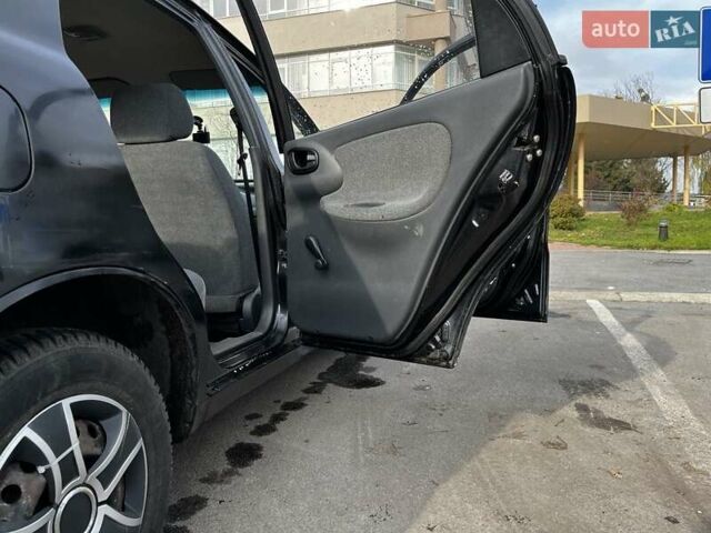 Коричневый Дэу Ланос, объемом двигателя 1.5 л и пробегом 195 тыс. км за 2350 $, фото 3 на Automoto.ua