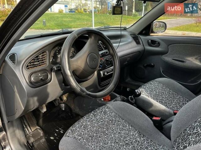 Коричневый Дэу Ланос, объемом двигателя 1.5 л и пробегом 195 тыс. км за 2350 $, фото 6 на Automoto.ua