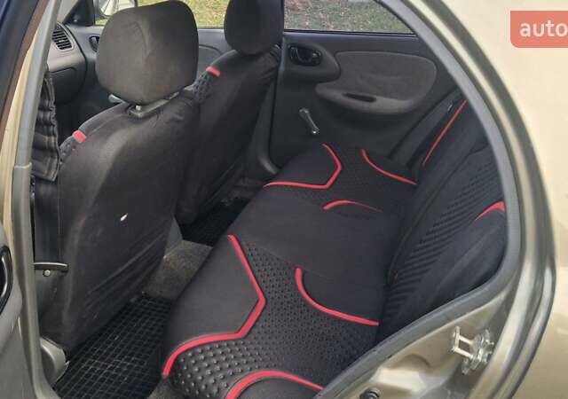 Коричневый Дэу Ланос, объемом двигателя 1.4 л и пробегом 150 тыс. км за 1750 $, фото 4 на Automoto.ua