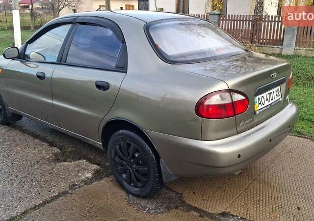 Коричневый Дэу Ланос, объемом двигателя 1.4 л и пробегом 150 тыс. км за 1750 $, фото 6 на Automoto.ua