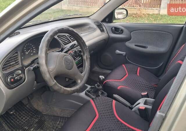 Коричневый Дэу Ланос, объемом двигателя 1.4 л и пробегом 150 тыс. км за 1750 $, фото 3 на Automoto.ua