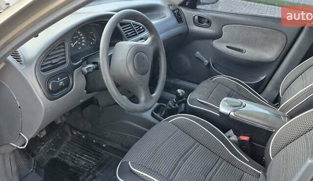 Коричневый Дэу Ланос, объемом двигателя 0 л и пробегом 150 тыс. км за 2500 $, фото 3 на Automoto.ua