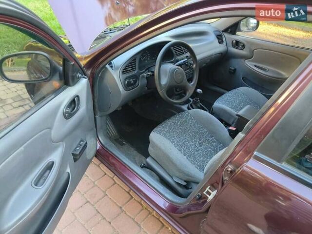 Коричневый Дэу Ланос, объемом двигателя 1.6 л и пробегом 110 тыс. км за 2500 $, фото 8 на Automoto.ua