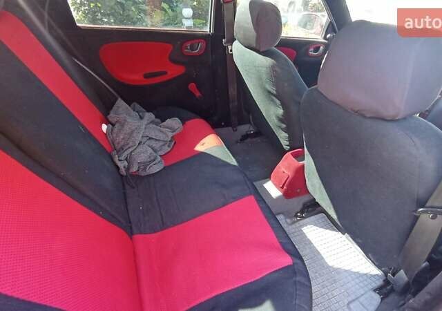 Червоний Деу Ланос, об'ємом двигуна 1.6 л та пробігом 170 тис. км за 1800 $, фото 5 на Automoto.ua