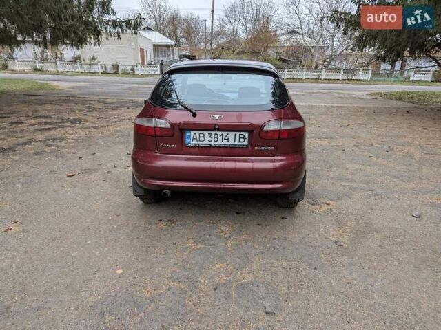 Красный Дэу Ланос, объемом двигателя 1.6 л и пробегом 304 тыс. км за 2050 $, фото 4 на Automoto.ua