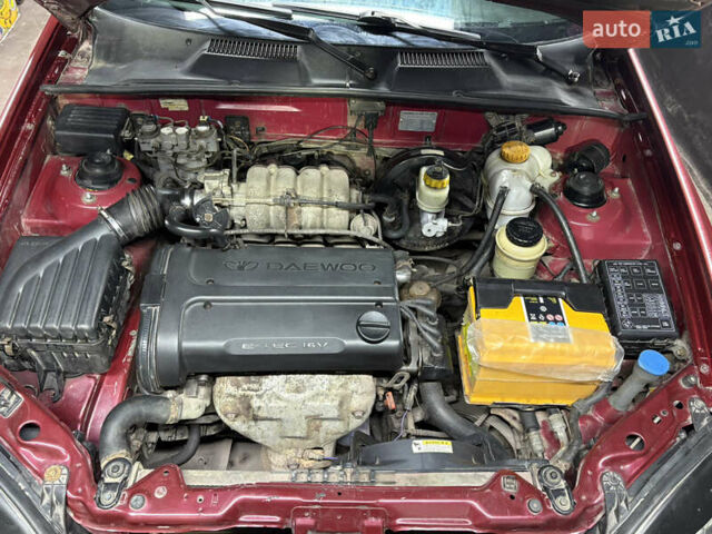 Красный Дэу Ланос, объемом двигателя 1.6 л и пробегом 200 тыс. км за 2000 $, фото 8 на Automoto.ua
