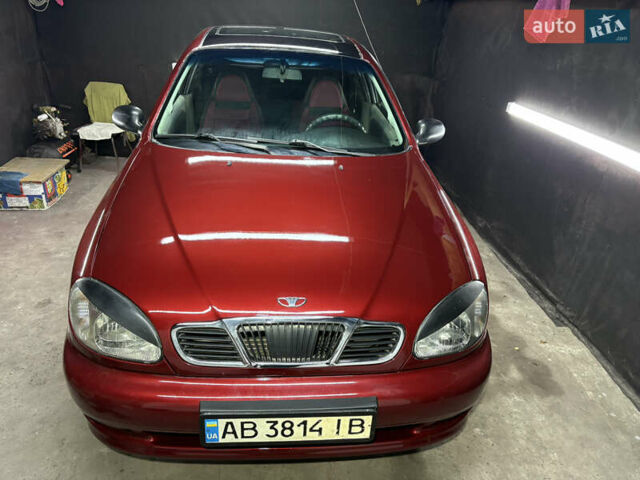 Красный Дэу Ланос, объемом двигателя 1.6 л и пробегом 200 тыс. км за 2000 $, фото 1 на Automoto.ua