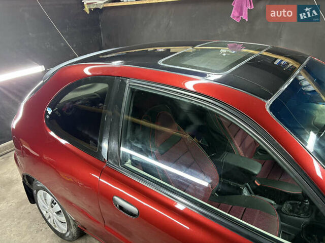 Красный Дэу Ланос, объемом двигателя 1.6 л и пробегом 200 тыс. км за 2000 $, фото 5 на Automoto.ua