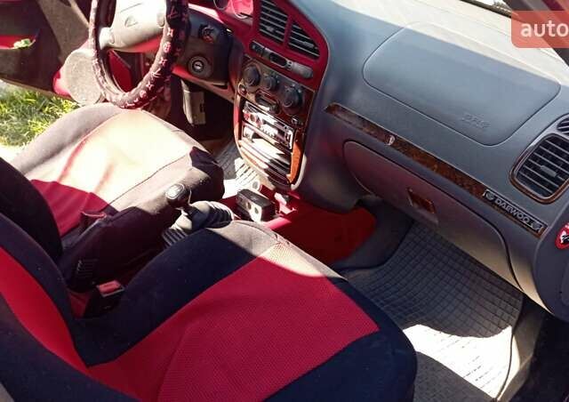 Червоний Деу Ланос, об'ємом двигуна 1.6 л та пробігом 170 тис. км за 1800 $, фото 10 на Automoto.ua
