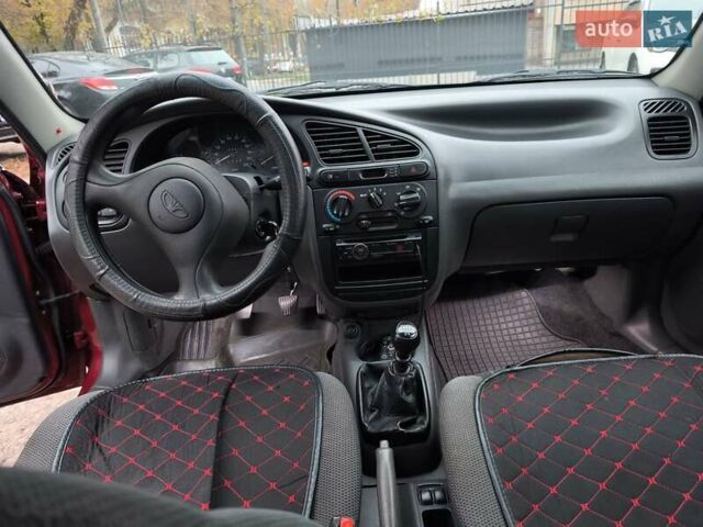 Красный Дэу Ланос, объемом двигателя 1.5 л и пробегом 160 тыс. км за 2750 $, фото 9 на Automoto.ua