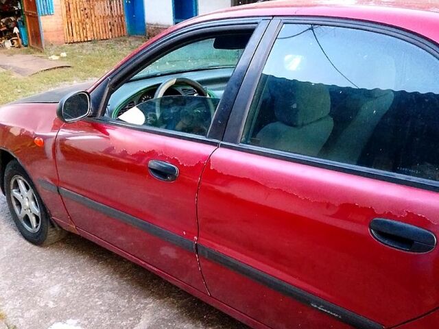 Дэу Ланос 2003 в Полтаве на Automoto.ua Красный Дэу Ланос, объемом двигателя 1.5 л и пробегом 227 тыс. км за 1600 $, фото 5 на Automoto.ua