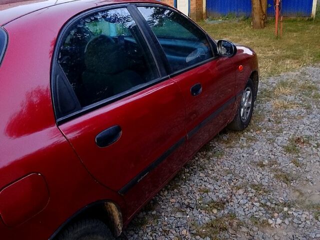 Дэу Ланос 2003 в Полтаве на Automoto.ua Красный Дэу Ланос, объемом двигателя 1.5 л и пробегом 227 тыс. км за 1600 $, фото 4 на Automoto.ua