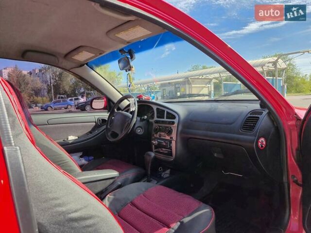 Красный Дэу Ланос, объемом двигателя 1.6 л и пробегом 249 тыс. км за 3300 $, фото 6 на Automoto.ua