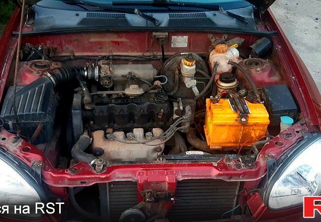 Дэу Ланос 2003 в Полтаве на Automoto.ua Красный Дэу Ланос, объемом двигателя 1.5 л и пробегом 227 тыс. км за 1600 $, фото 3 на Automoto.ua
