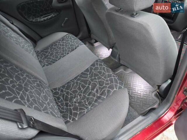 Красный Дэу Ланос, объемом двигателя 1.5 л и пробегом 160 тыс. км за 2750 $, фото 10 на Automoto.ua
