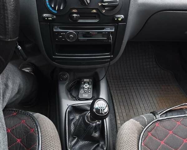 Красный Дэу Ланос, объемом двигателя 1.5 л и пробегом 160 тыс. км за 2750 $, фото 8 на Automoto.ua