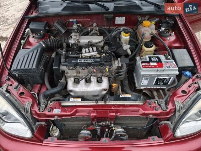 Красный Дэу Ланос, объемом двигателя 1.5 л и пробегом 160 тыс. км за 2750 $, фото 13 на Automoto.ua