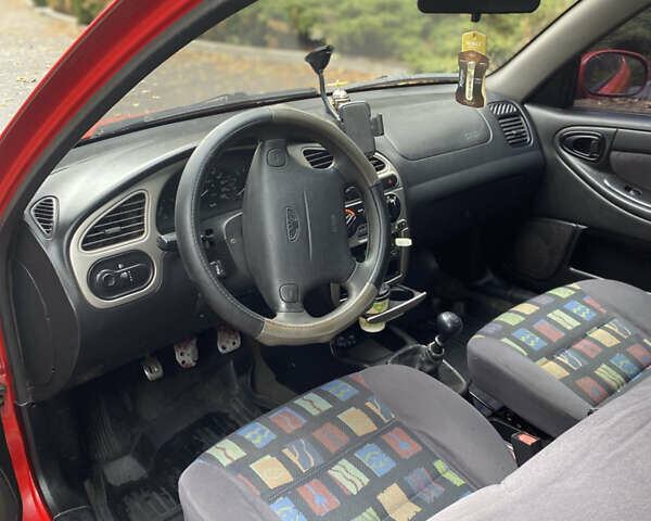 Красный Дэу Ланос, объемом двигателя 1.6 л и пробегом 235 тыс. км за 2350 $, фото 4 на Automoto.ua