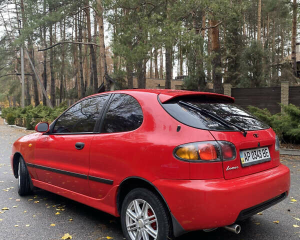 Красный Дэу Ланос, объемом двигателя 1.6 л и пробегом 235 тыс. км за 2350 $, фото 3 на Automoto.ua