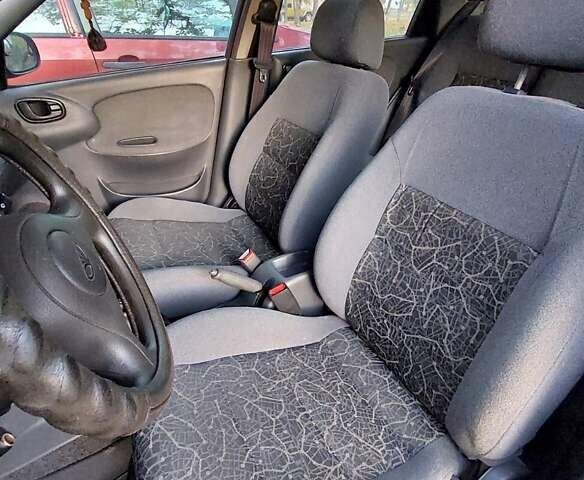 Красный Дэу Ланос, объемом двигателя 1.5 л и пробегом 139 тыс. км за 2400 $, фото 4 на Automoto.ua