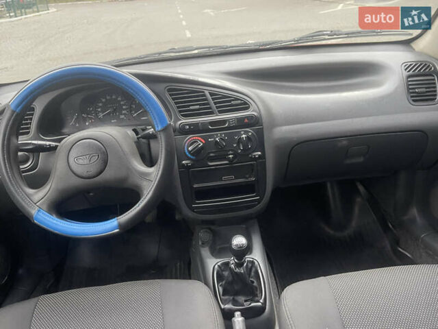 Красный Дэу Ланос, объемом двигателя 1.5 л и пробегом 194 тыс. км за 2300 $, фото 13 на Automoto.ua