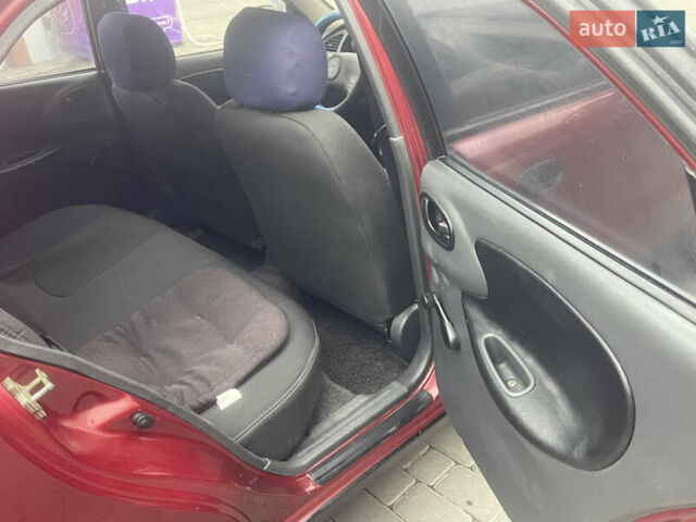 Красный Дэу Ланос, объемом двигателя 1.5 л и пробегом 194 тыс. км за 2300 $, фото 11 на Automoto.ua